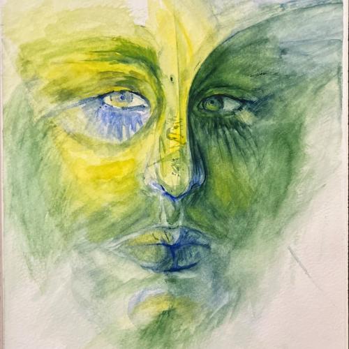 A picture of a face in green and yellow hues