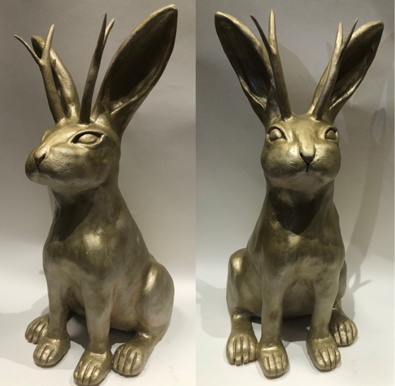 Ceramic creation of a jackalope rabbit painted gold